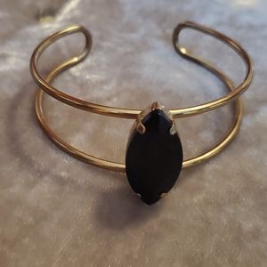 Gold Tone Cuff Bracelet with Black Teardrop Stone